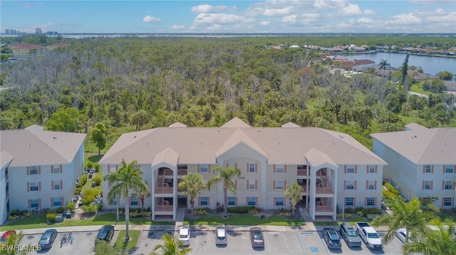 1763 Four Mile Cove Pkwy Unit 611, Cape Coral, FL 33990 - aerial view of a large body of water and a heavily wooded area
