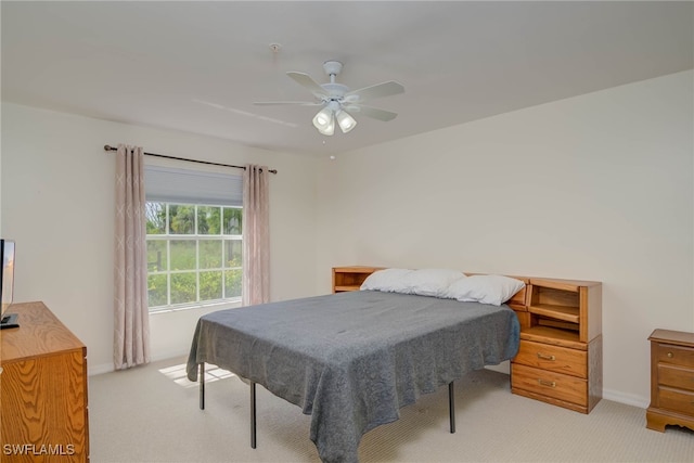 1763 Four Mile Cove Pkwy Unit 611, Cape Coral, FL 33990 - bedroom with light colored carpet and ceiling fan