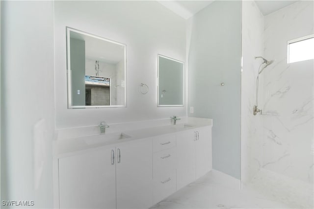 4002 22nd St SW, Lehigh Acres, FL 33976 - bathroom featuring double vanity, a marble finish shower, and marble finish floors