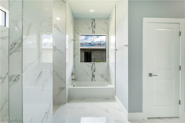 4002 22nd St SW, Lehigh Acres, FL 33976 - bathroom with a bath and marble finish floors