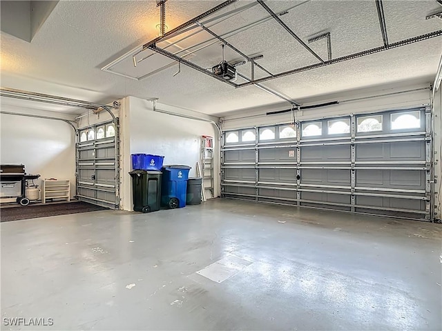 2050 Rio Nuevo Dr, North Fort Myers, FL 33917 - garage featuring a garage door opener