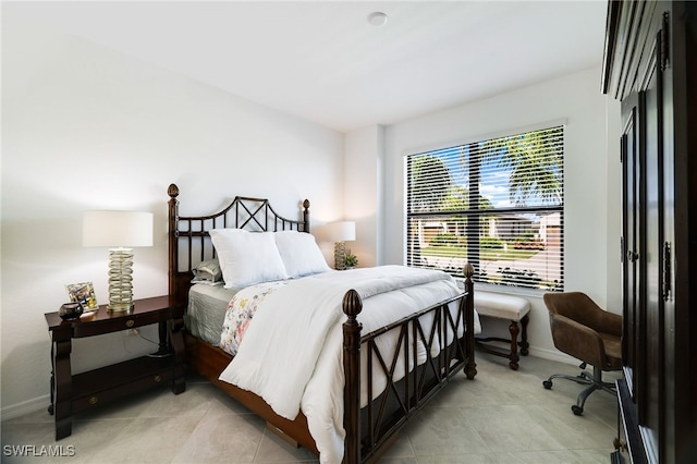 3470 Nombella Ct, Fort Myers, FL 33905 - tiled bedroom featuring baseboards