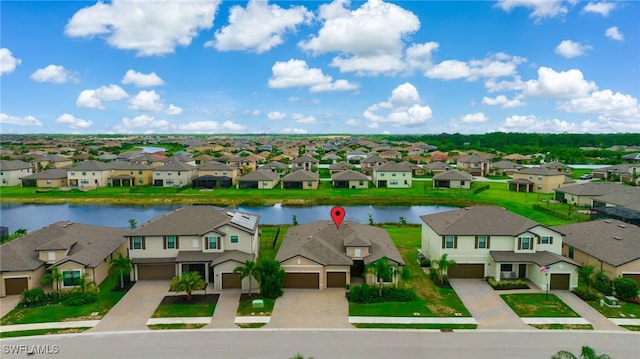 3470 Nombella Ct, Fort Myers, FL 33905 - aerial perspective of suburban area with a nearby body of water