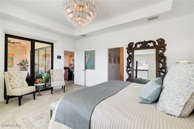 3470 Nombella Ct, Fort Myers, FL 33905 - bedroom featuring a chandelier and a tray ceiling
