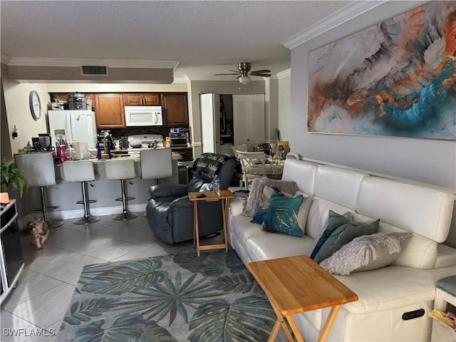 5307 Summerlin Rd Unit 704, Fort Myers, FL 33919 - living area featuring crown molding, a ceiling fan, and light tile patterned floors