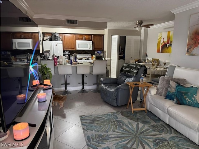 5307 Summerlin Rd Unit 704, Fort Myers, FL 33919 - living area with ornamental molding, light tile patterned floors, and a ceiling fan