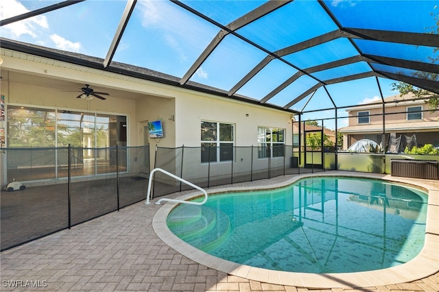 8169 Silver Birch Way, Lehigh Acres, FL 33971 - outdoor pool with a patio area, a ceiling fan, and a lanai
