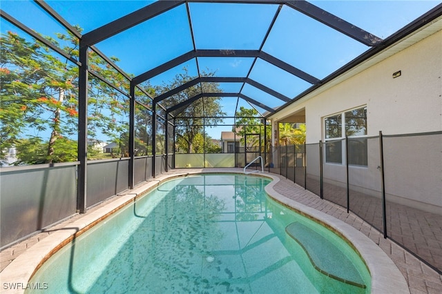 8169 Silver Birch Way, Lehigh Acres, FL 33971 - swimming pool featuring glass enclosure