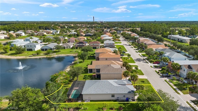 8169 Silver Birch Way, Lehigh Acres, FL 33971 - aerial view of residential area with property boundaries highlighted and a large body of water