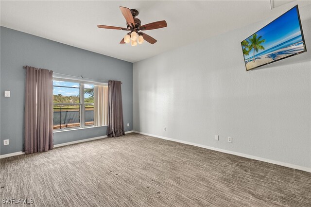 8169 Silver Birch Way, Lehigh Acres, FL 33971 - unfurnished room with a ceiling fan and carpet