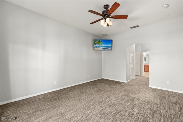 8169 Silver Birch Way, Lehigh Acres, FL 33971 - unfurnished room featuring arched walkways, carpet flooring, and ceiling fan