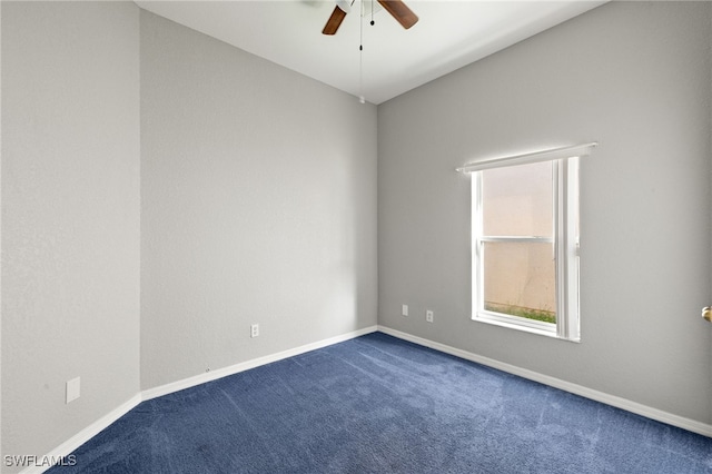 8169 Silver Birch Way, Lehigh Acres, FL 33971 - empty room featuring ceiling fan and dark colored carpet