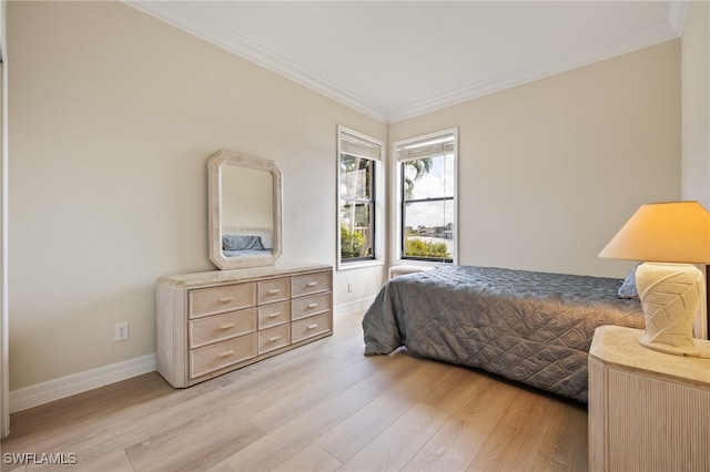 1167 SW 57th St, Cape Coral, FL 33914 - bedroom featuring ornamental molding and light wood-style floors