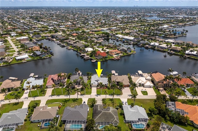 1167 SW 57th St, Cape Coral, FL 33914 - aerial view of residential area featuring a nearby body of water