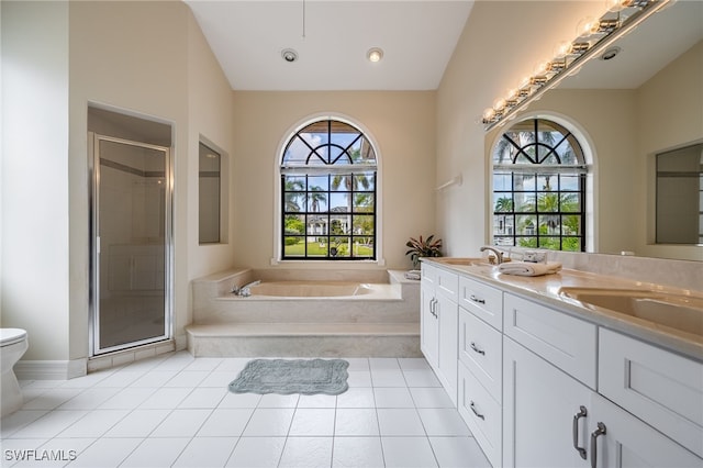 1167 SW 57th St, Cape Coral, FL 33914 - bathroom with a garden tub, double vanity, plenty of natural light, and a stall shower