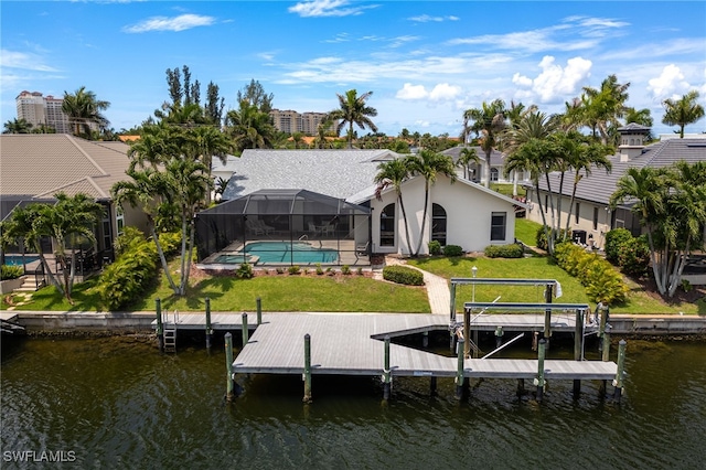 1167 SW 57th St, Cape Coral, FL 33914 - dock area with a water view, boat lift, and an outdoor pool
