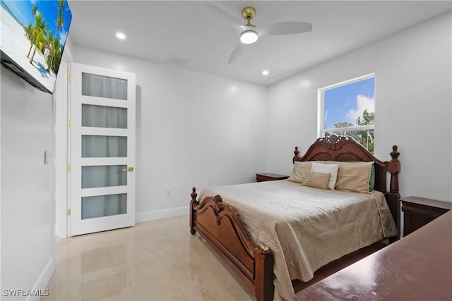 192 Herron Rd, North Fort Myers, FL 33903 - bedroom with recessed lighting, ceiling fan, and light marble finish flooring