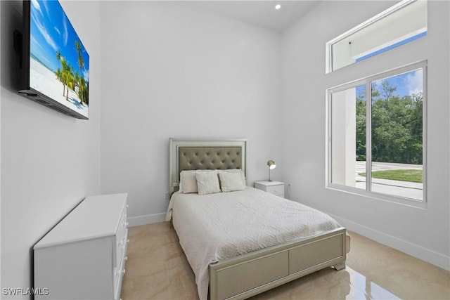 192 Herron Rd, North Fort Myers, FL 33903 - bedroom featuring light colored carpet, a towering ceiling, and recessed lighting