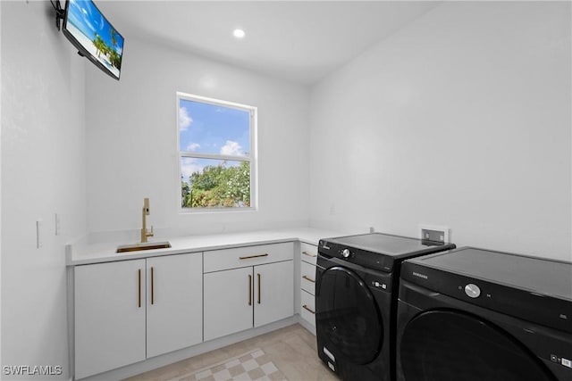 192 Herron Rd, North Fort Myers, FL 33903 - washroom with washing machine and dryer, cabinet space, and recessed lighting