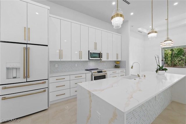 192 Herron Rd, North Fort Myers, FL 33903 - kitchen featuring electric stove, high end fridge, white cabinetry, tasteful backsplash, and recessed lighting