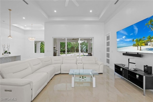 192 Herron Rd, North Fort Myers, FL 33903 - living area featuring a tray ceiling, recessed lighting, marble tiled flooring, and ceiling fan