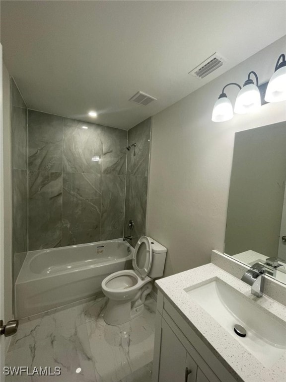 4532/4534 22nd St SW, Lehigh Acres, FL 33973 - bathroom with vanity, washtub / shower combination, and marble look tile flooring