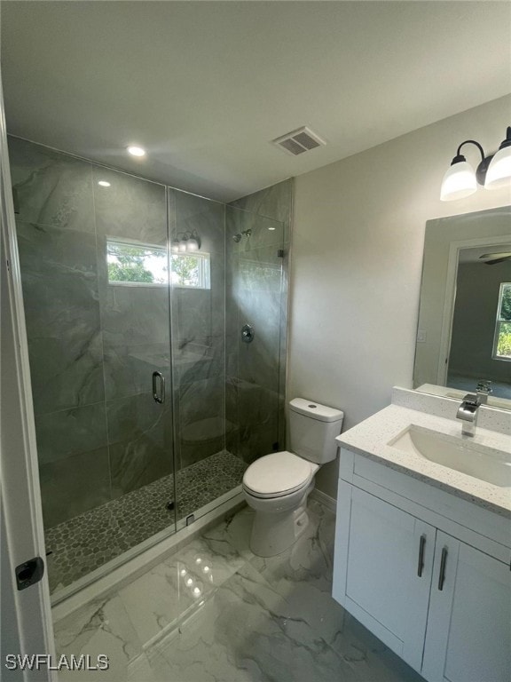 4532/4534 22nd St SW, Lehigh Acres, FL 33973 - bathroom featuring vanity, a stall shower, marble finish flooring, and recessed lighting