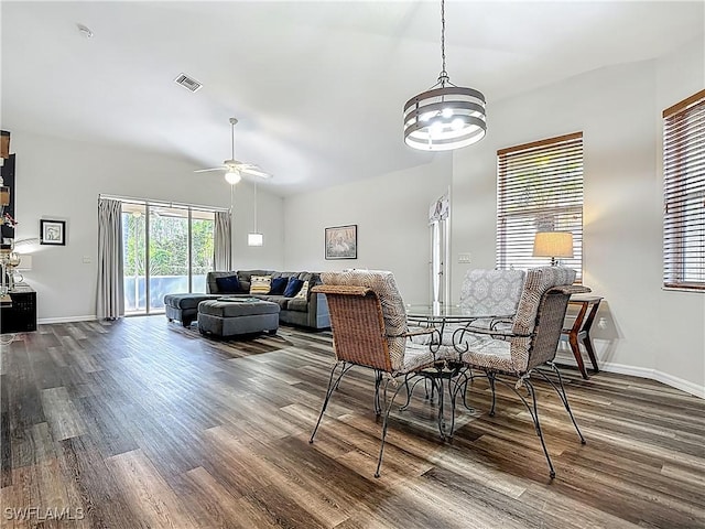 20698 Marathona Ct, North Fort Myers, FL 33917 - dining area with dark wood-style flooring, ceiling fan, and a chandelier