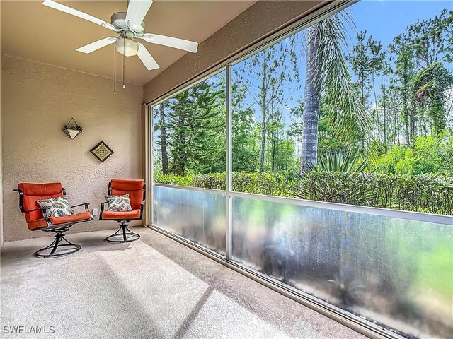 20698 Marathona Ct, North Fort Myers, FL 33917 - sunroom / solarium with ceiling fan and view of scattered trees