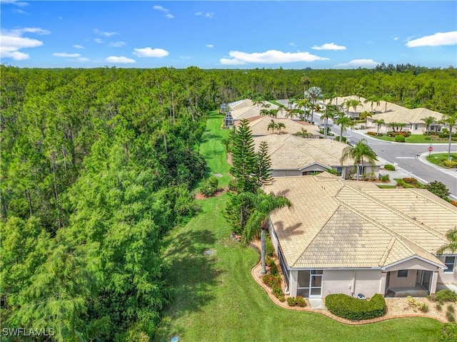 20698 Marathona Ct, North Fort Myers, FL 33917 - aerial perspective of suburban area with a forest