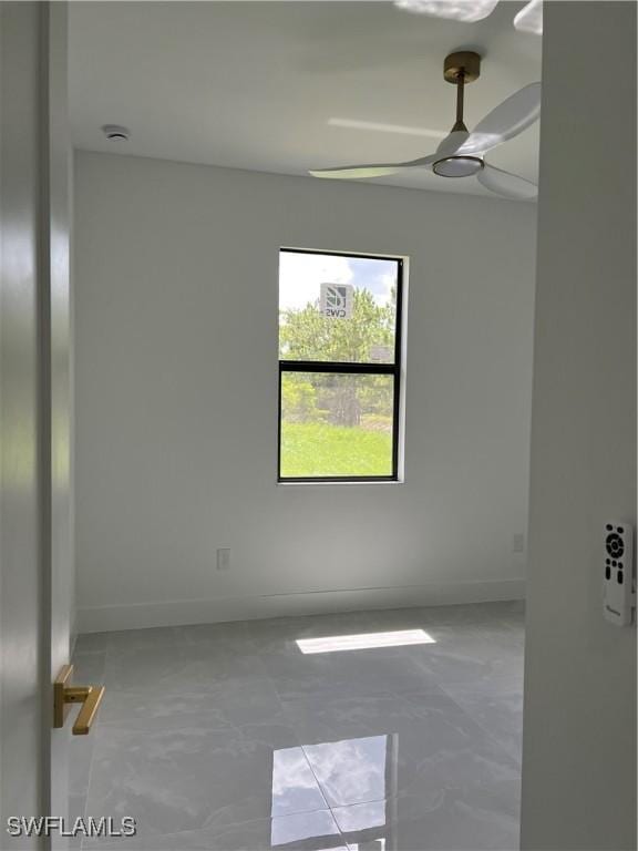 756 Chemstrand St E, Lehigh Acres, FL 33974 - unfurnished room with baseboards