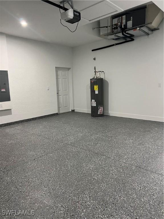 756 Chemstrand St E, Lehigh Acres, FL 33974 - garage featuring electric water heater, a garage door opener, and electric panel