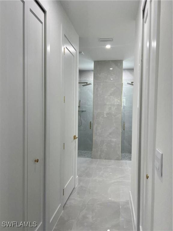 756 Chemstrand St E, Lehigh Acres, FL 33974 - hall with marble finish flooring