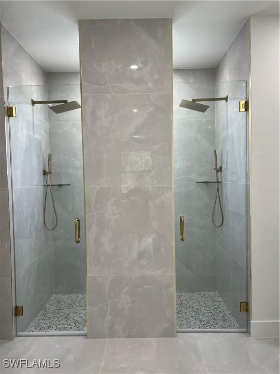 756 Chemstrand St E, Lehigh Acres, FL 33974 - full bath featuring a stall shower and tile patterned floors
