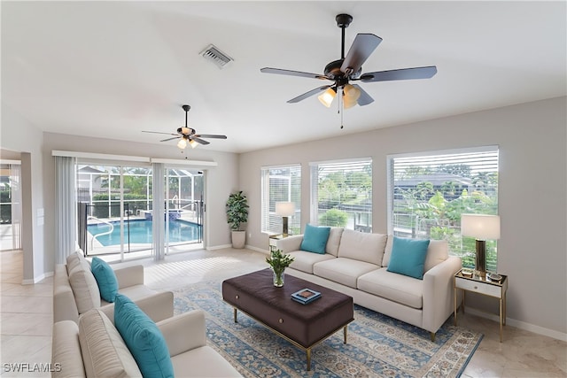 4200 SW 3rd Ave, Cape Coral, FL 33914 - living area featuring a ceiling fan and light tile patterned floors