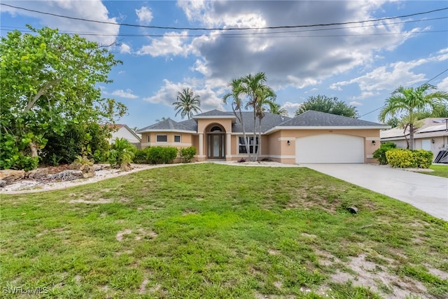 4200 SW 3rd Ave, Cape Coral, FL 33914 - view of front facade featuring stucco siding, a garage, concrete driveway, and a front lawn