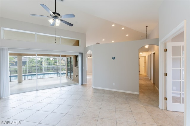 4200 SW 3rd Ave, Cape Coral, FL 33914 - empty room featuring arched walkways, high vaulted ceiling, a ceiling fan, light tile patterned floors, and recessed lighting