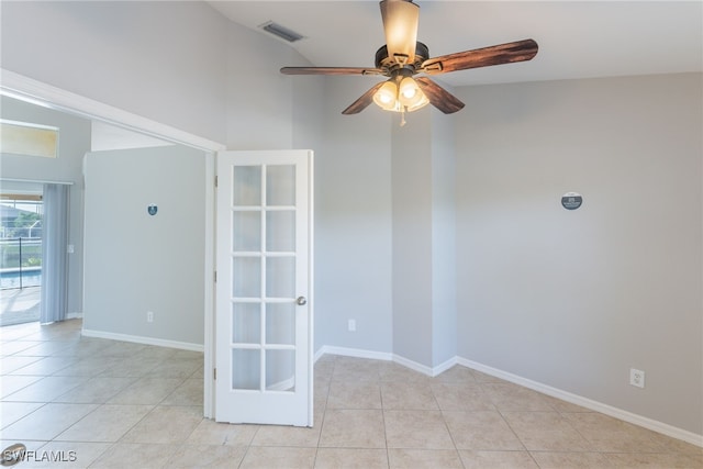 4200 SW 3rd Ave, Cape Coral, FL 33914 - spare room with light tile patterned floors, a ceiling fan, and a towering ceiling