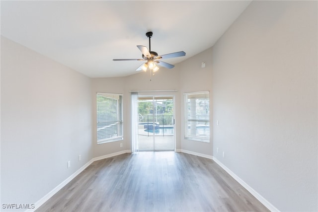 4200 SW 3rd Ave, Cape Coral, FL 33914 - unfurnished room with lofted ceiling, wood finished floors, and a ceiling fan
