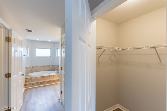 4200 SW 3rd Ave, Cape Coral, FL 33914 - spacious closet featuring wood finished floors