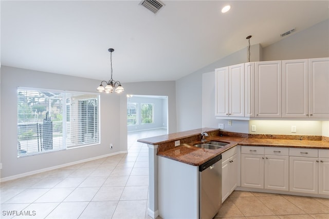 4200 SW 3rd Ave, Cape Coral, FL 33914 - kitchen featuring dishwasher, a peninsula, light tile patterned floors, white cabinets, and decorative light fixtures