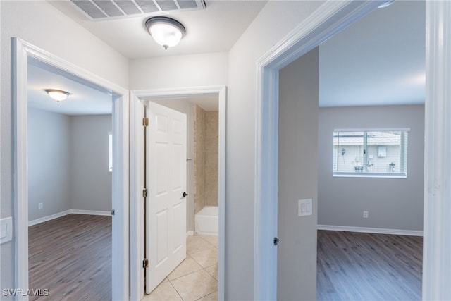 4200 SW 3rd Ave, Cape Coral, FL 33914 - hallway featuring light wood-type flooring