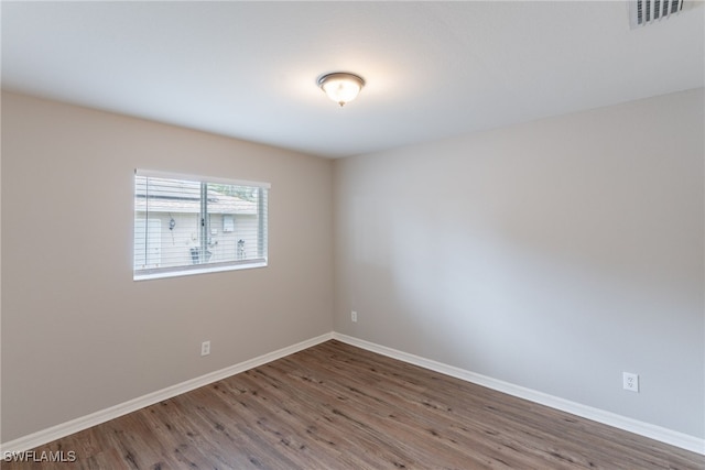 4200 SW 3rd Ave, Cape Coral, FL 33914 - spare room with wood finished floors and baseboards
