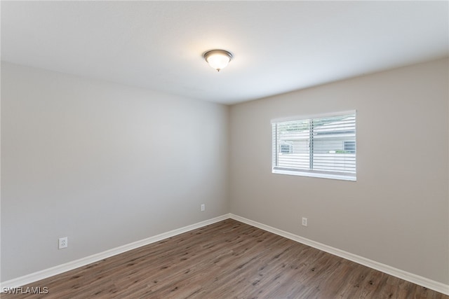 4200 SW 3rd Ave, Cape Coral, FL 33914 - spare room with wood finished floors and baseboards