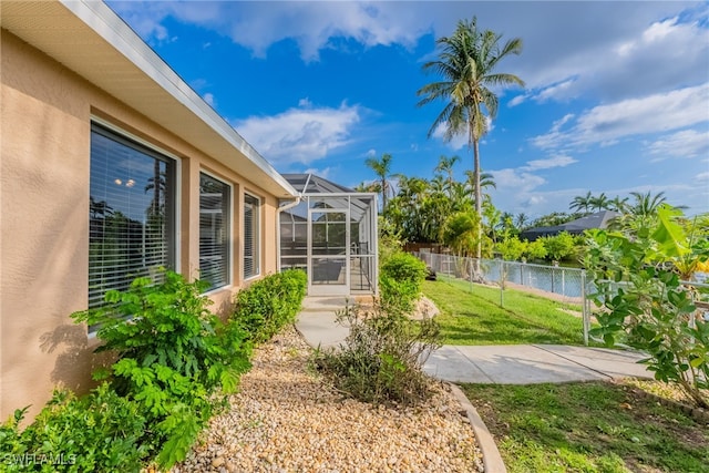 4200 SW 3rd Ave, Cape Coral, FL 33914 - view of yard featuring a lanai, a water view, and a patio