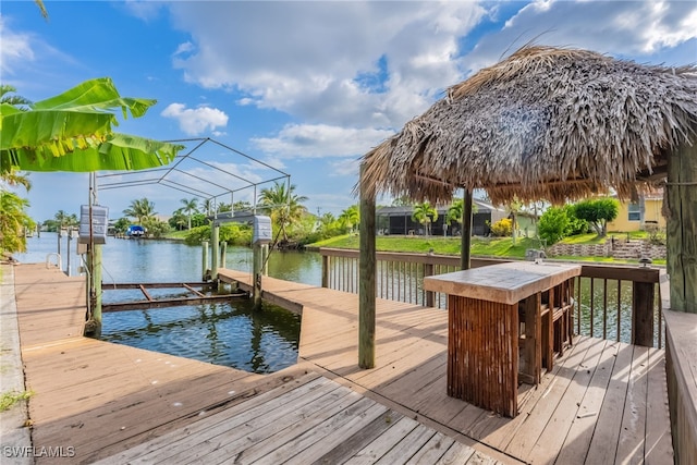 4200 SW 3rd Ave, Cape Coral, FL 33914 - dock featuring boat lift and a water view