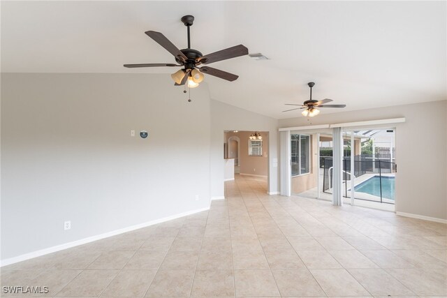 4200 SW 3rd Ave, Cape Coral, FL 33914 - spare room featuring ceiling fan, lofted ceiling, and light tile patterned floors