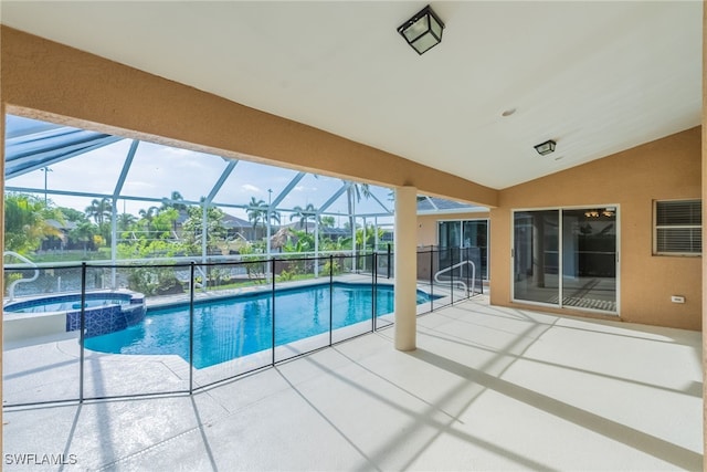 4200 SW 3rd Ave, Cape Coral, FL 33914 - view of swimming pool featuring a patio, a pool with connected hot tub, and a lanai