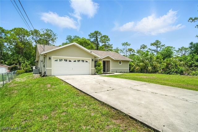 2711 4th St NW, Naples, FL 34120 - ranch-style house with concrete driveway, stucco siding, and an attached garage