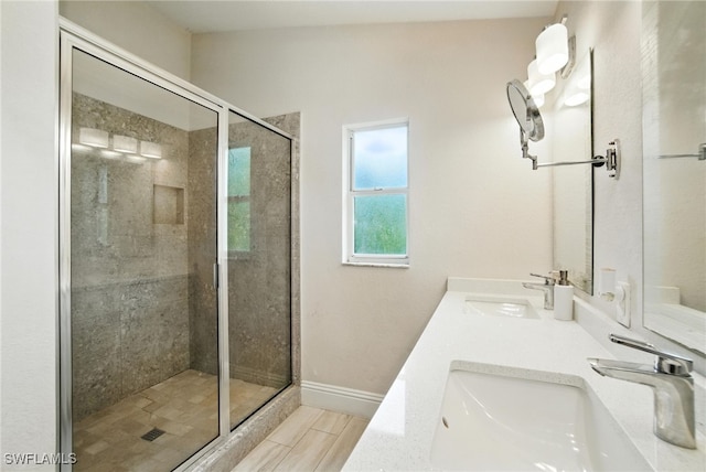2711 4th St NW, Naples, FL 34120 - bathroom featuring a stall shower and double vanity